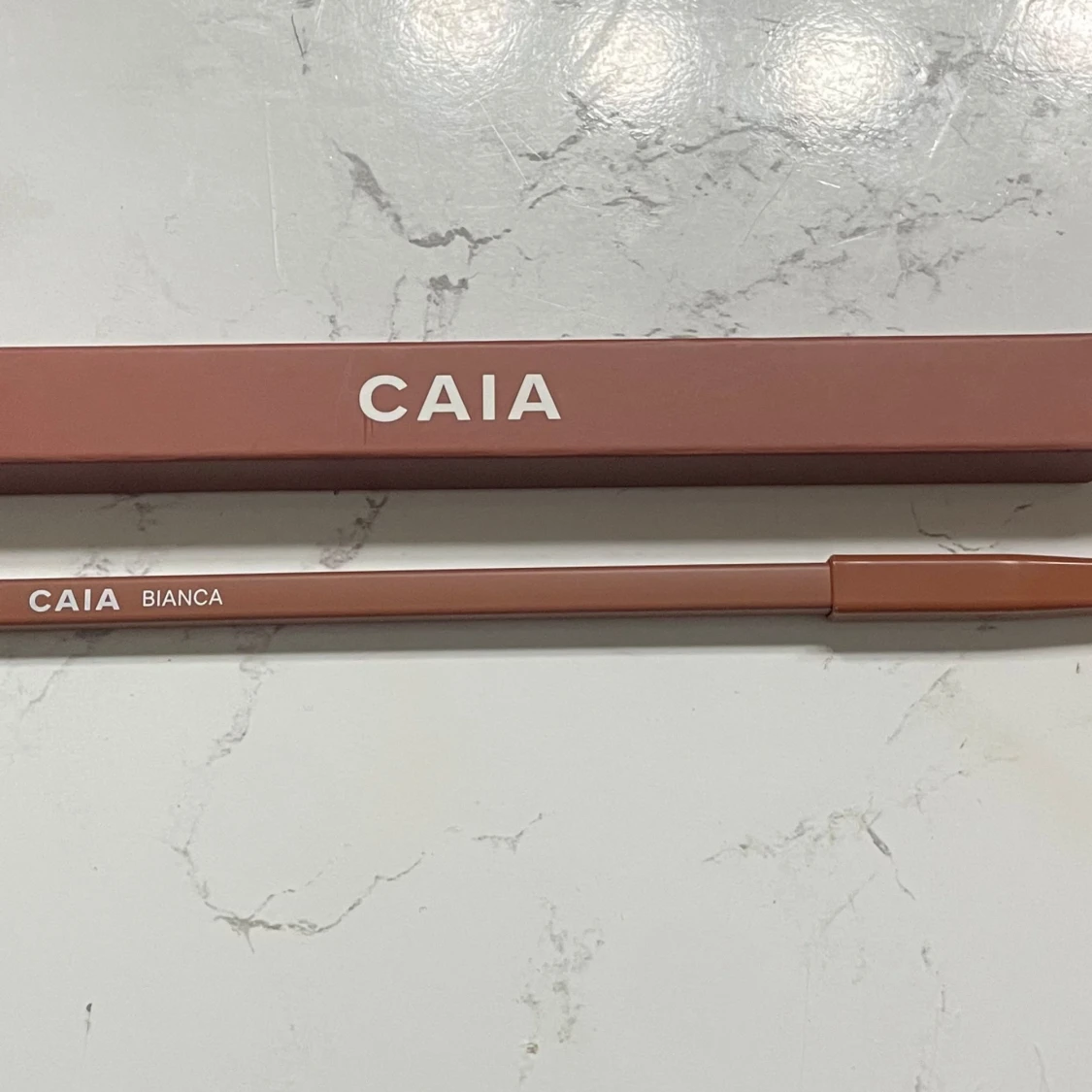 CAIA läpppena i färgen bianca  - 90