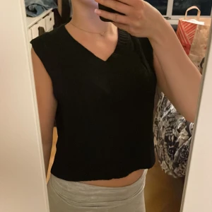 Väst  - Svart väst storlek xs