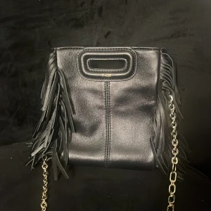 maje väska - Jätte fint skick på väskan köpt på plick men aldrig använd.