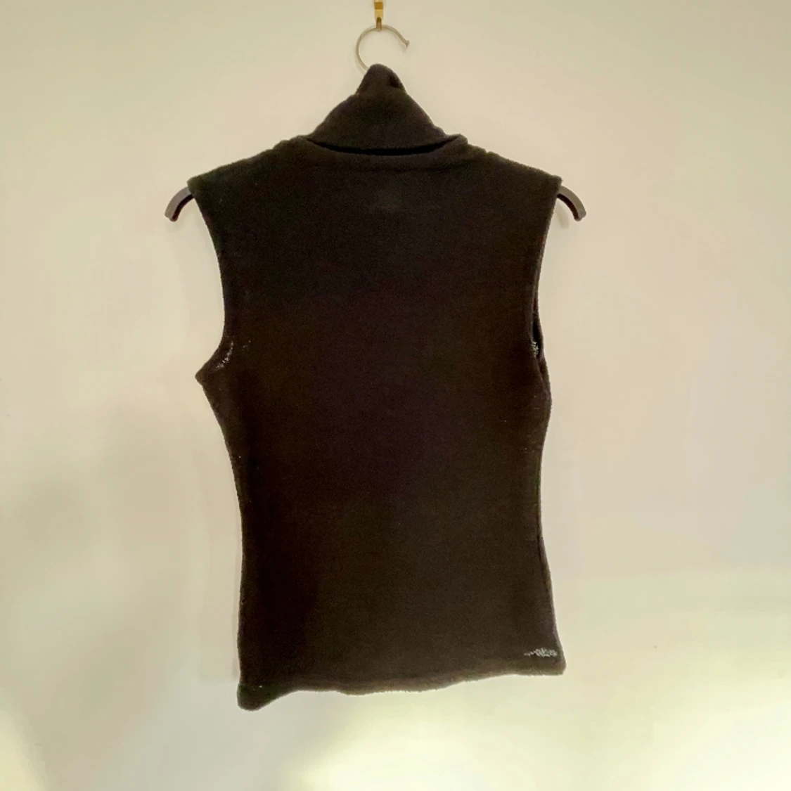 Ärmlös bouclet tröja - 90