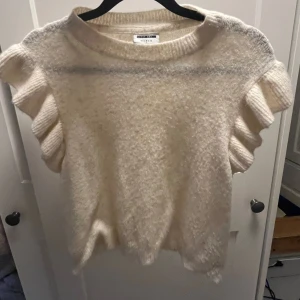 Stickad tshirt - Sparsamt använd