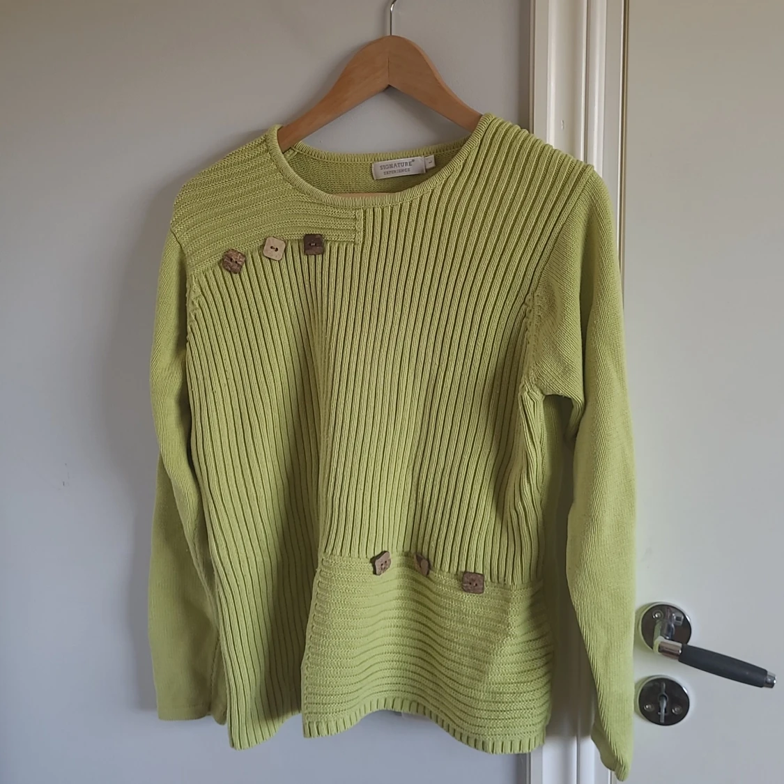 Stickad grön tröja