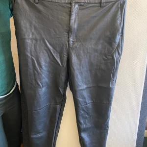 Läder byxor  - Svarta läder byxor