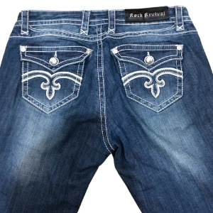 Rock revival jeans - Tja! Säljer nu dessa rock revival jeans. De är i bra skick och inga defekter. De är 97cm långa och 38cm i midjan. Jag är 170cm men tror det är dam byxor. Skriv privat för fler frågor.