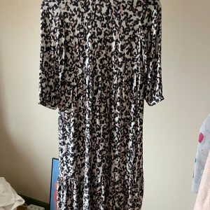Klänning  - Bra skick, lång fin klänning. Storlek 134, från Next 