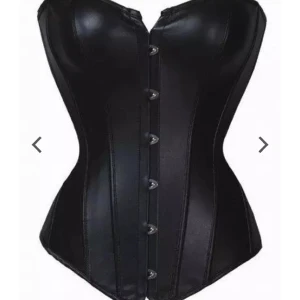 Korsett  - Jätte fin och endast använd en gång korsett i konstläder från Toplady.