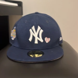 Baseball keps New Era - Kepsen är 60,6 cm, som var för stor för mig och tänkte köpa en annan.