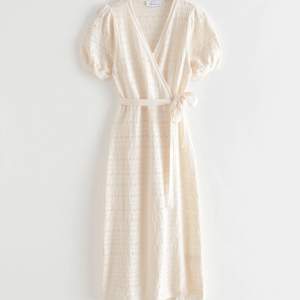 & other stories wrap dress in cream. Worn only a few times and no defects.  Can send more pics upon request! 