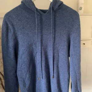 Merinoull hoddie - Säljer min blåa merinoulls hoodie från gardegrisch bra skick