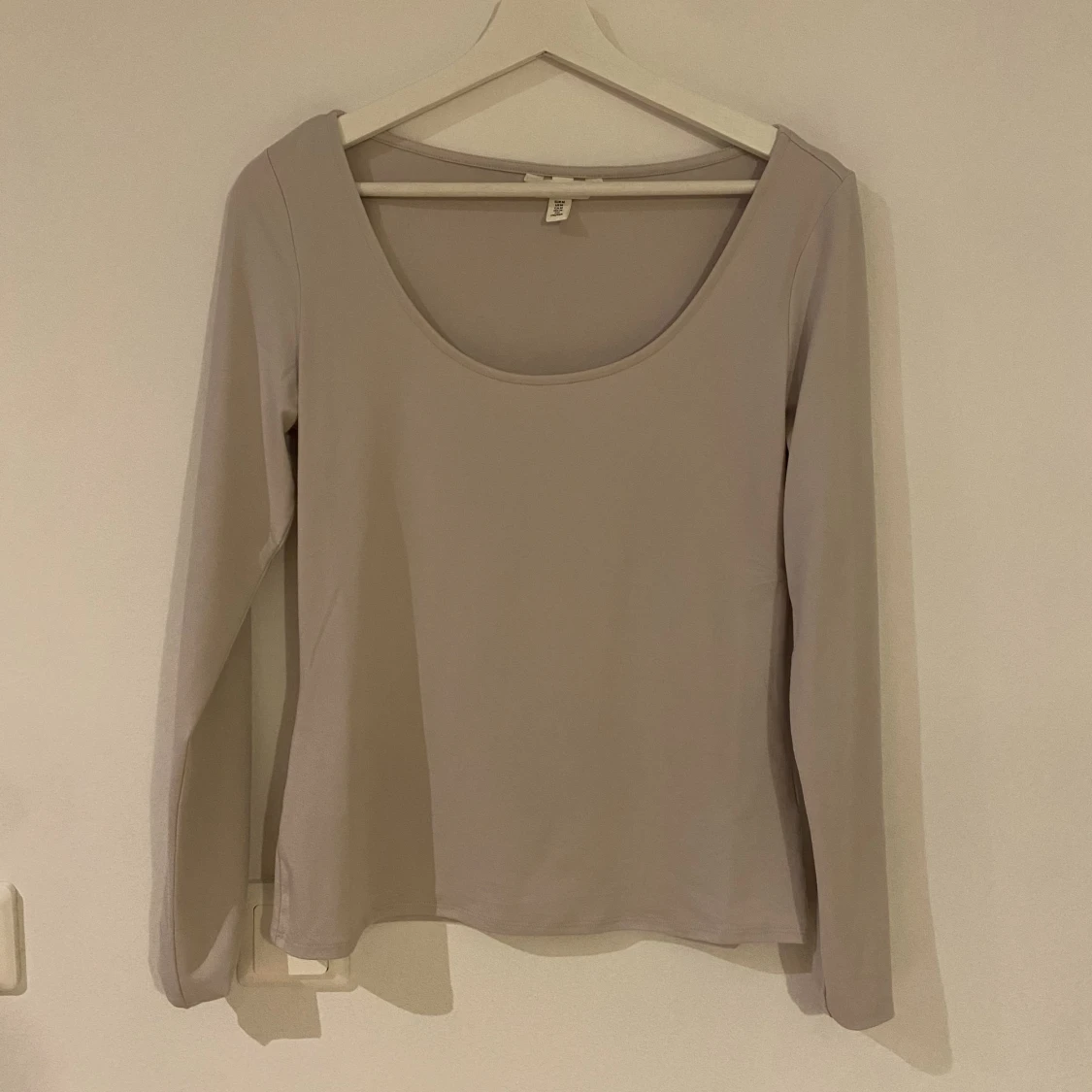 Långärmad beige topp