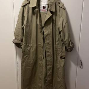 Selling my vintage trench coat from Humana. It is pretty big. But suitable for oversized for people who wear M or L