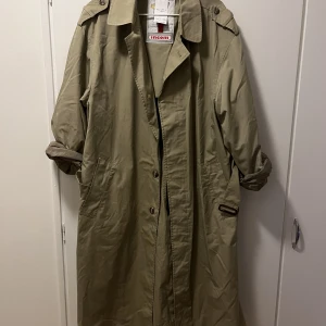 Vintage trench coat - Selling my vintage trench coat from Humana. It is pretty big. But suitable for oversized for people who wear M or L