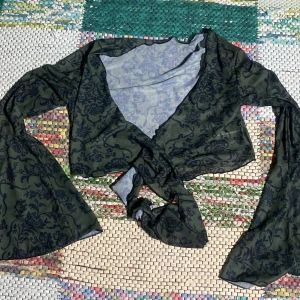 Kort kofta - Har aldrig användt den. Tunt material.