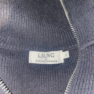 Ljung full-zip  - 10/10 cond, strlk L 