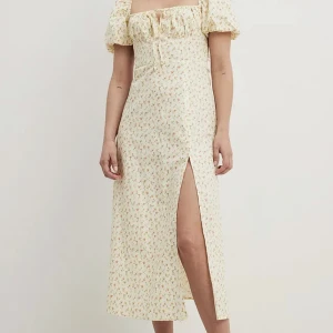 Klänning  - Midiklänning i bomull med kupdetalj från NA-KD. Aldrig använd, prislappen sitter kvar. Nypris 699kr. Storlek 38