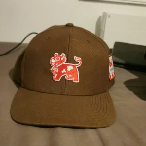 Keps - En unik arla ko keps, beställd på hatstore. Väldigt fint skick! 