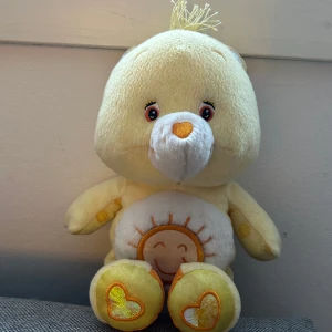 Carebears gosedjur  - Carebears gosedjur i super skick, den har en bjällra och en spegel på magen. inga defekter. Vanliga storleken. Säljer fler. Använd köp nu, garanterad snabb postning