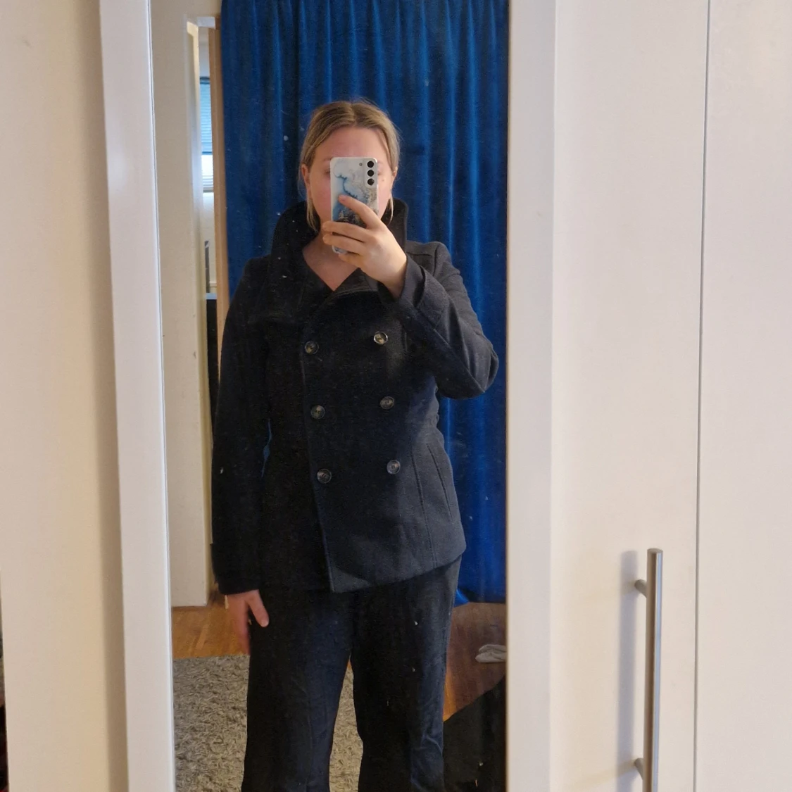 Marinblå vinterkappa