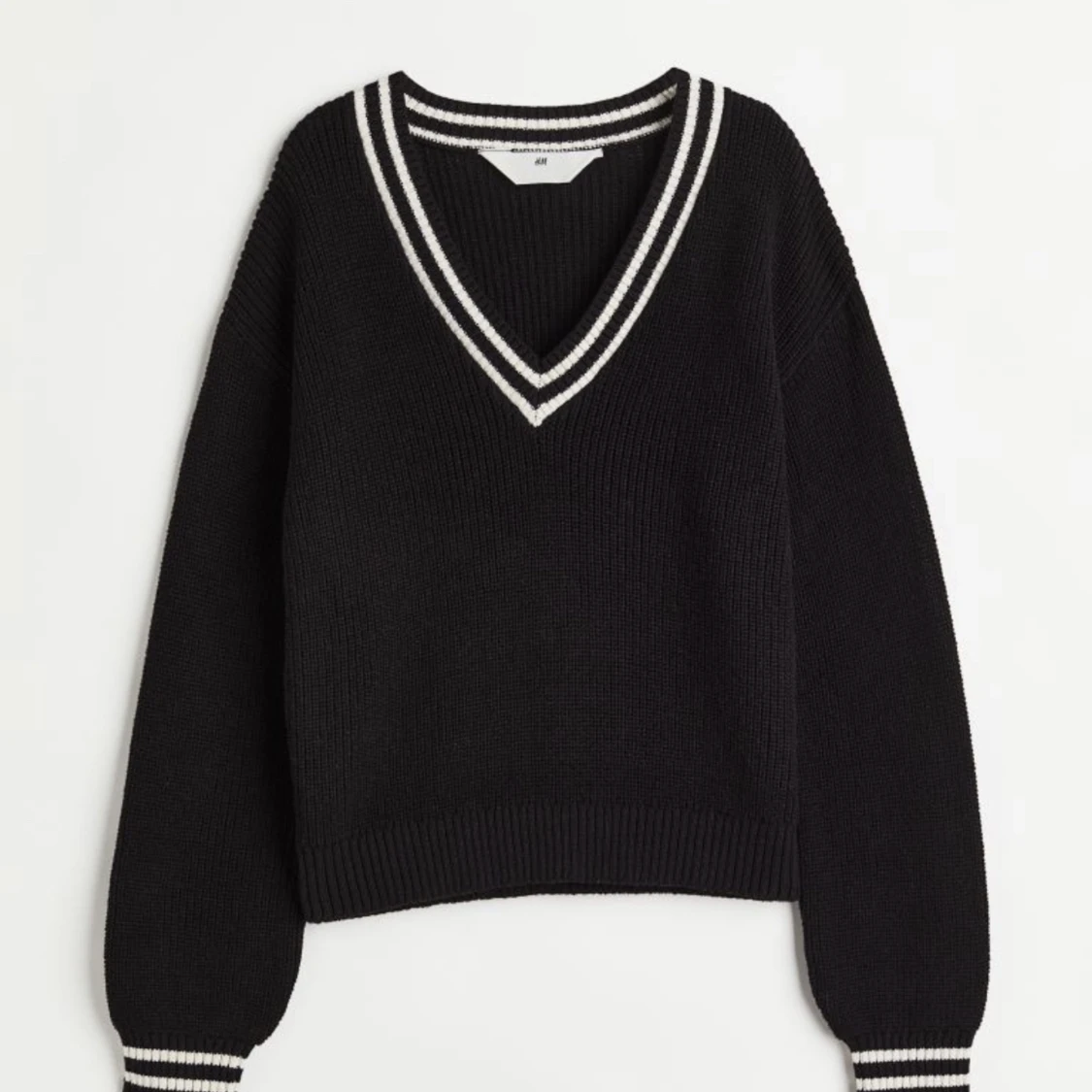 Svart stickad tröja