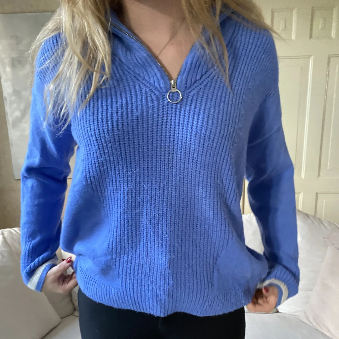 Blå stickad halt-zip