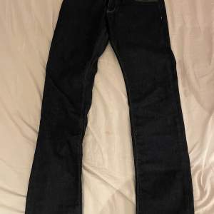 Tommy hillfiger jeans i bra skick storlek 31-34