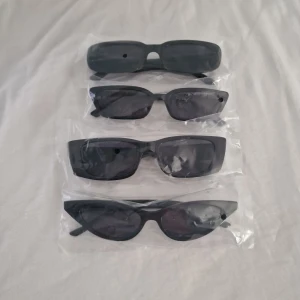 Solglasögon - 4 par helt nya solglasögon,har inte kommit till användning
