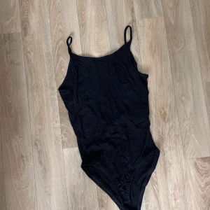 Body  - Good condition, has an open back. 