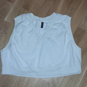 ärmlös tjocktröja - ärmlös tjocktröja inte använd