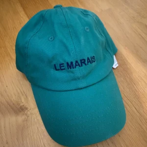 Grön keps - Grön keps, 50kr +frakt. Aldrig använd