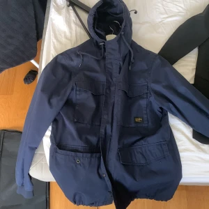 Jacka  - Blå vind jacka