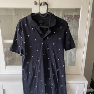 Piketröja - Tunnare pike med palmer