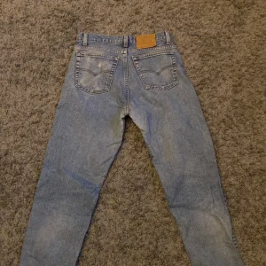 Levis 550 blå jeans - Skick: Bra
