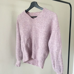 Stickad tröja  - Rosa stickad tröja i stolek s 