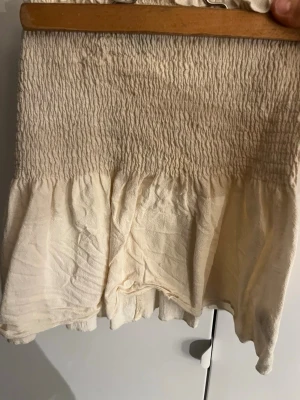 Kjol tröja  - Det är en topp som även kan användas som kjol