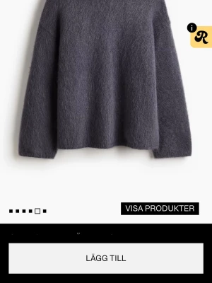 Mörkgrå stickad tröja - Mysig mörkgrå stickad tröja i mohair matrial. 