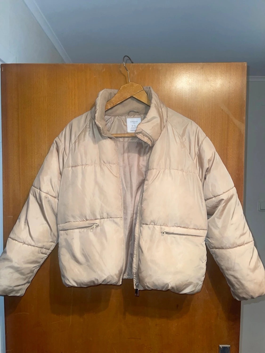 Beige pufferjacka från Lindex