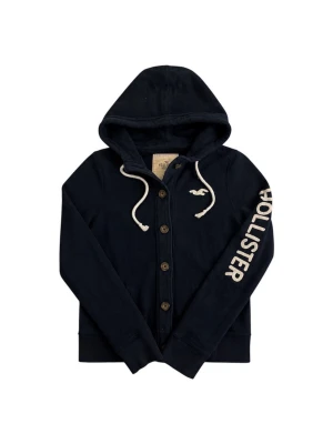 Marinblå hoodie från Hollister - Snygg marinblå hoodie från Hollister med knappar framtill och vit logga på bröstet, skick 9/10 inga defekter, hör av dig vid minsta fundering 
