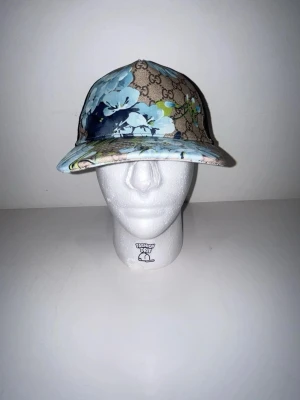 Gg blommig keps  - Helt ny gg keps som är oanvänd för ett billigt pris