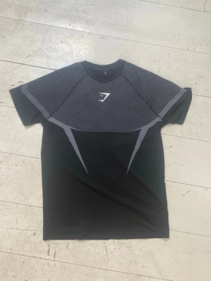 Svart/Grå Gymshark Onyx 5.0 - Helt ny och oanvänd träningströja i storlek M. Rep.