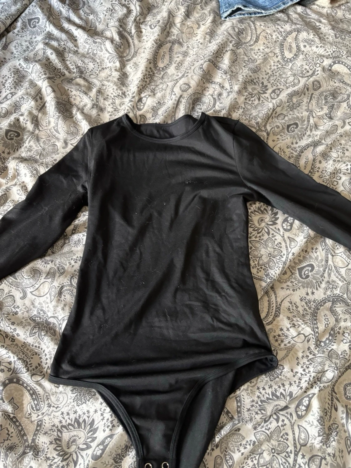 Svart långärmad body XS