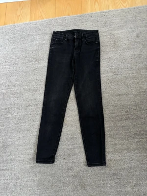 Svarta skinny jeans med stretch - Fina skinny jeans i ett mycket bra skick