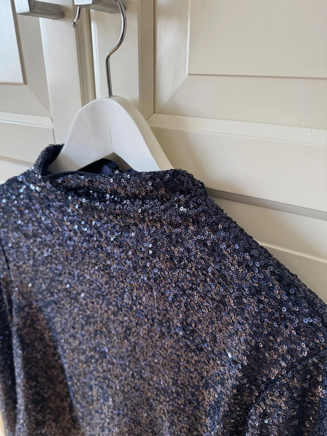 Svart glittrig polotopp - 1