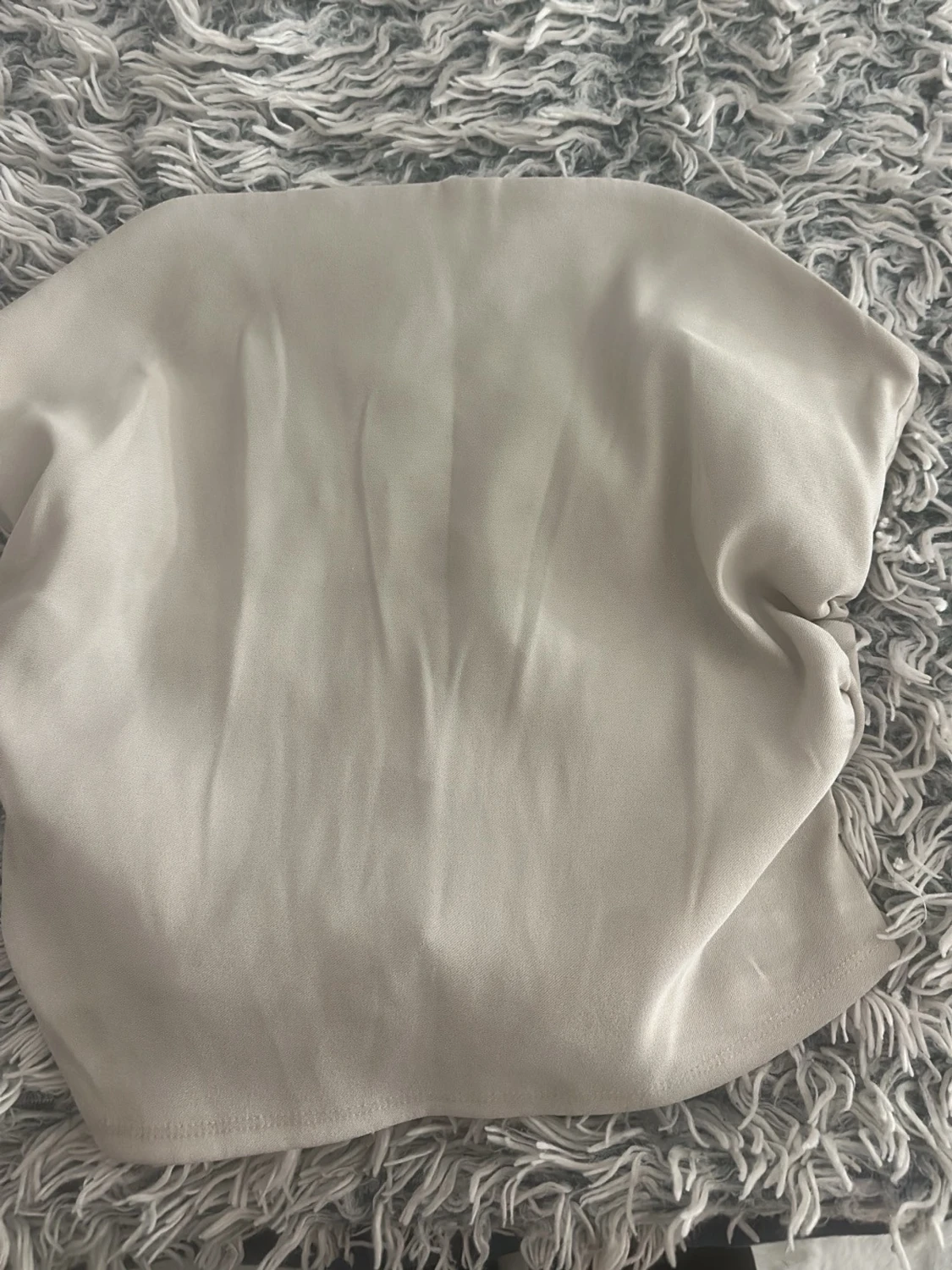 Beige axelbandslös tubtopp