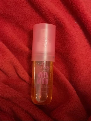 RARE!! When In Rio - Sol de Janeiro perfume - Its discontinued limited edition! full and only defect is the black paint on it, im not sure if you can remove it! 