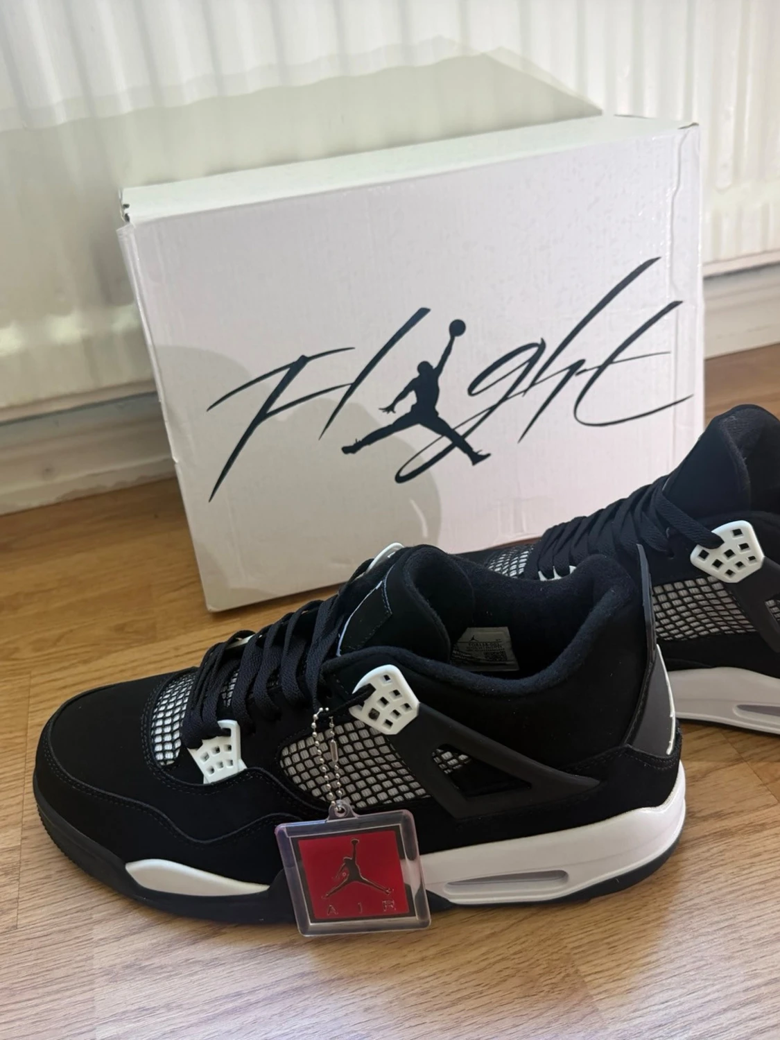 Svarta Air Jordan 4 Retro sneakers