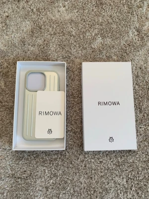 Rimowa iPhone Case  - Modell: IPhone 14, kan även fixa specifika modeller. Helt ny! 
