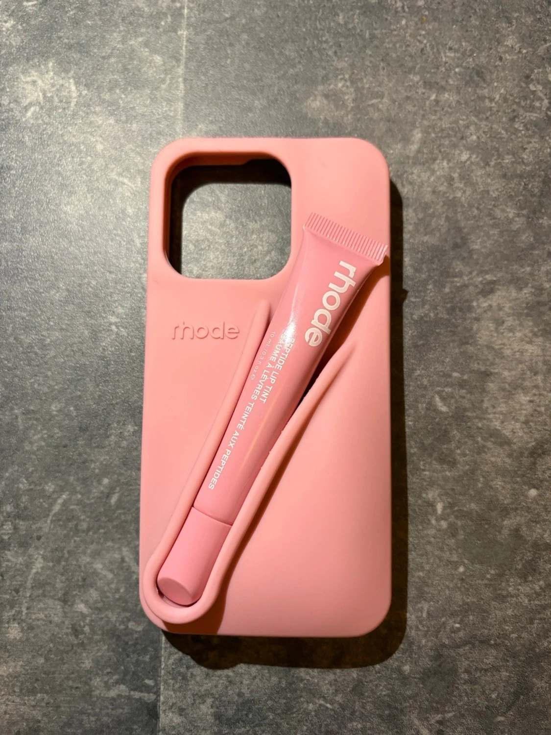 Rosa mobilskal Rhode med läppglansfack