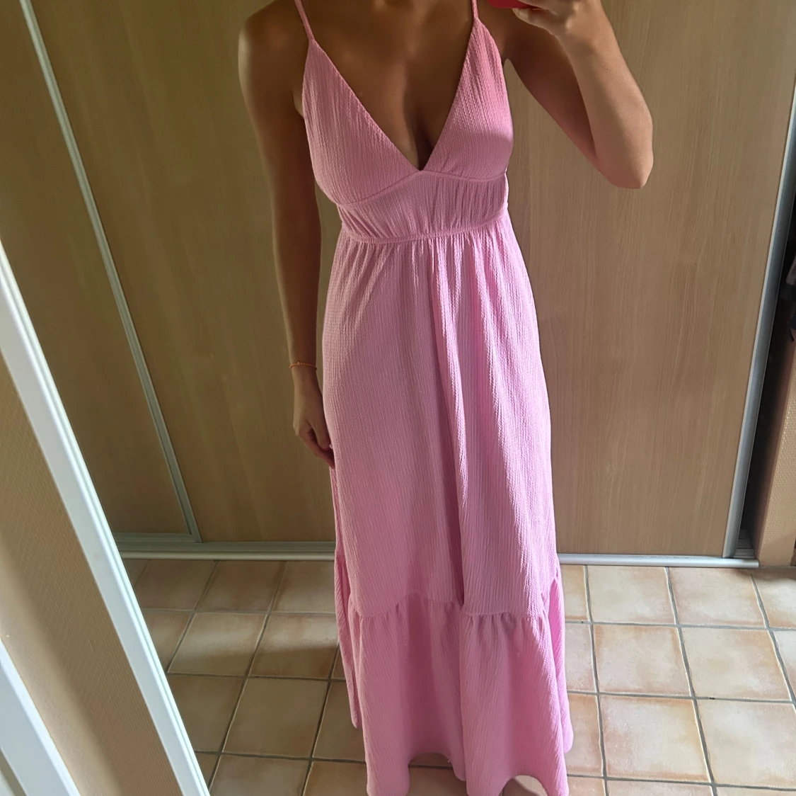 Ljusrosa långklänning med smala axelband