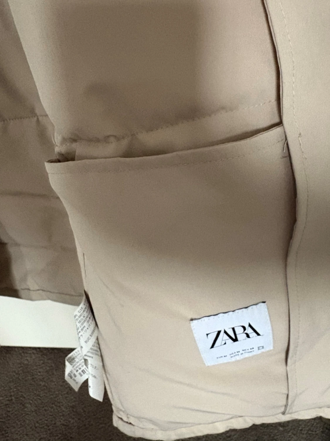 Beige dunväst med hög krage - 3