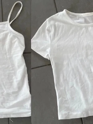 Två vita baslinnen och t-shirt - Säljer ett vitt linne med smala axelband och en vit t-shirt med rund hals. Båda är enkla basplagg i mjuk bomull, perfekta att matcha med allt. Stilrena och klassiska toppar som funkar året runt.